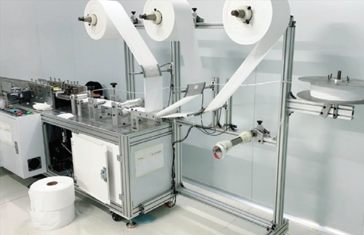 Máy tự động chạy cuộn vải không dệt